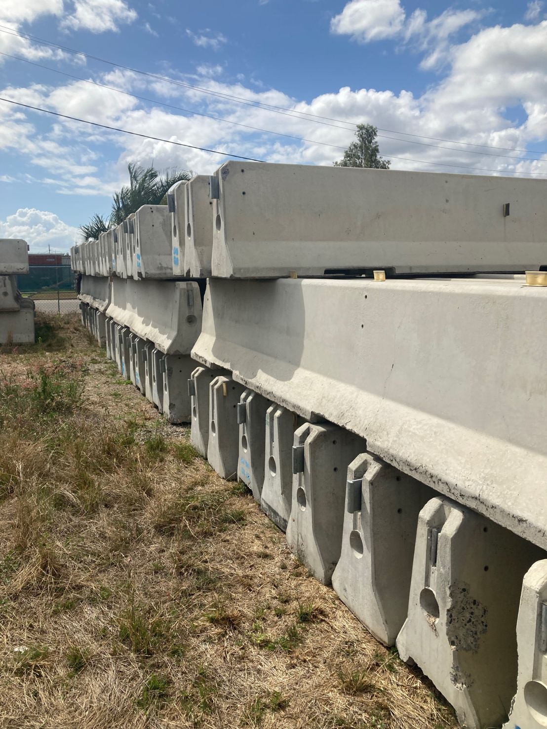 DB80 concrete barriers stacked in the yard ready for hire